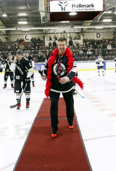 Bonnyville Mayor Gene Sobolewski dons a pair of red high heels during last year&#8217;sWalk a Mile in Her Shoes event.