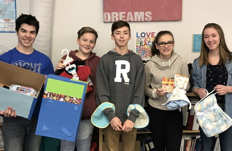 Grade 8 students of Dr. Bernard Brosseau School are helping young mothers in the community.