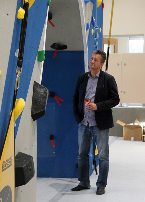  Mayor Craig Copeland eyes up the climbing wall added to the Cold Lake Energy Centre through the most recent expansion.