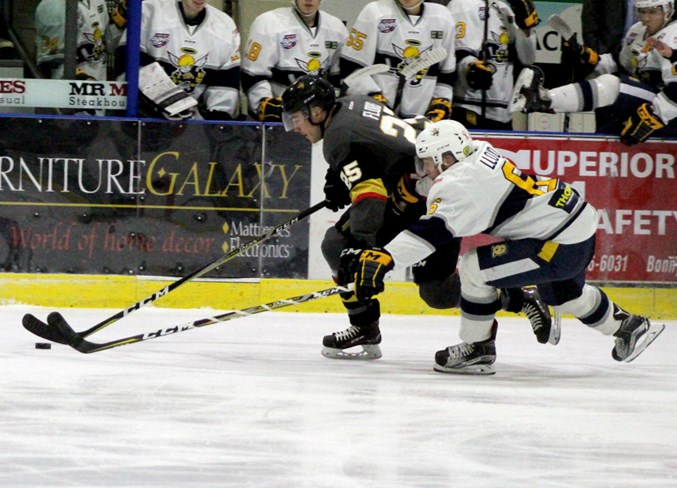  Hunter Floris speeds across the ice with his eye on the goal.