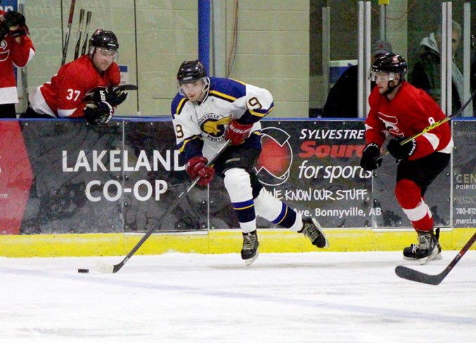  Adam Tilford skates his way across the ice.