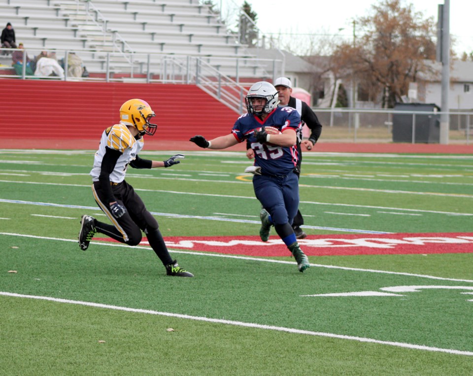  Duncan Critch on his way to the end zone.