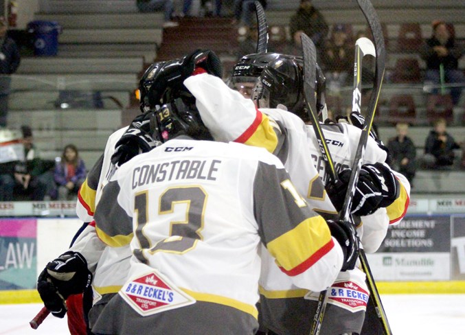  The Pontiacs celebrate after Grayson Constable’s goal in the third period.