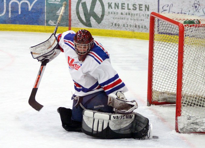  Participant Randy Smith saves a shot against the Zone 6 net during one of the hockey games at the Cold Lake Energy Centre.