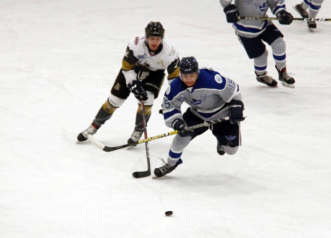  Heading down the ice is Johan Crowchild.