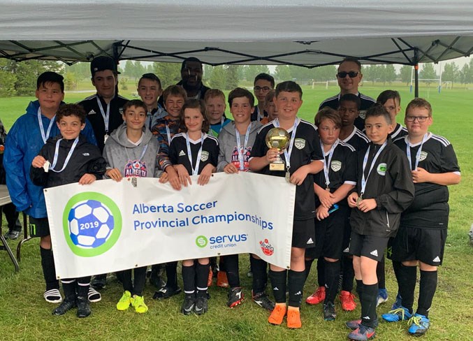  Due to the weather, the U13 boys got silver after their game was called due to rain and a coin toss determined they came in second.