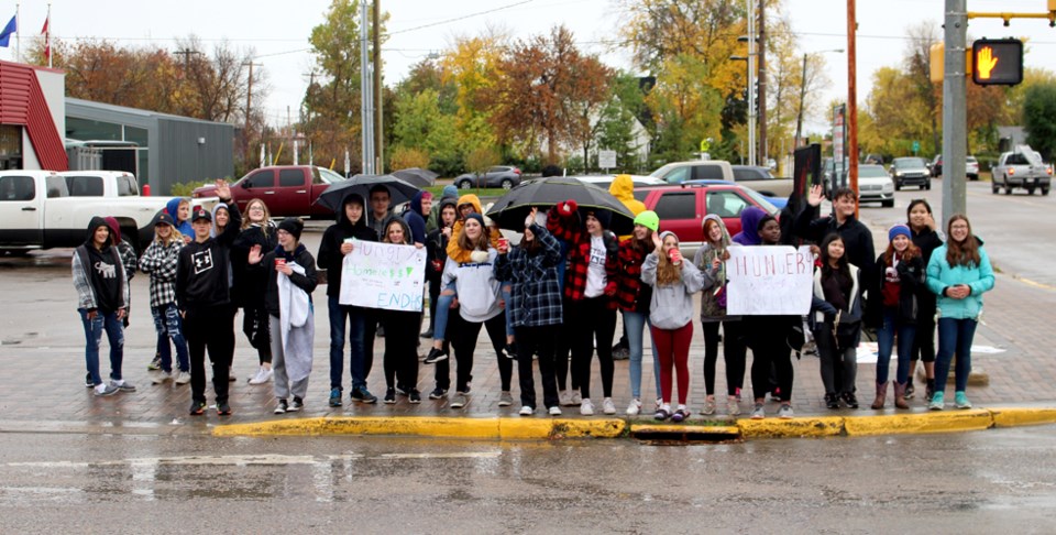  Groups of students were at three different locations around town asking for non-perishable food and monetary donations.