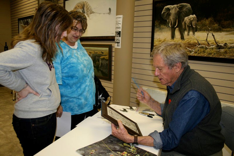 Fans of Robert Bateman&#8217;s work lined up at the artist&#8217;s appearance in St. Paul on Nov. 1 to chat with him and get work signed.