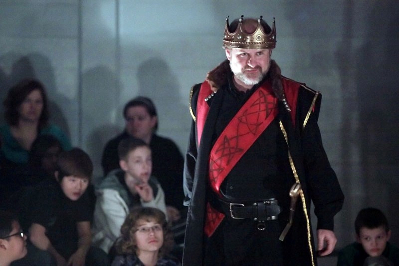 Richard Beaune plays King Duncan in Macbeth at Racette school on Friday.