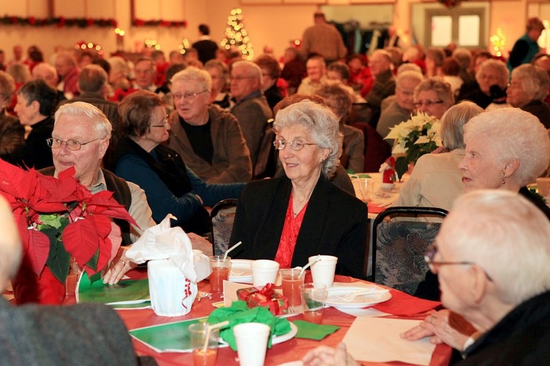 Denise Joly (center) enjoys the entertainment at St. Paul recreation Centre on Wednesday afternoon during the St. Paul Seniors&#8217; Gala, which was attended by 350 seniors.