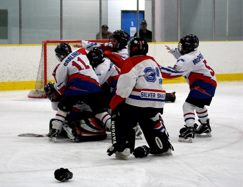 Kids from last season&#8217;s Atom A team with St. Paul and District Minor Hockey Association celebrate winning provincial gold at the March tournament. Hosting provincials