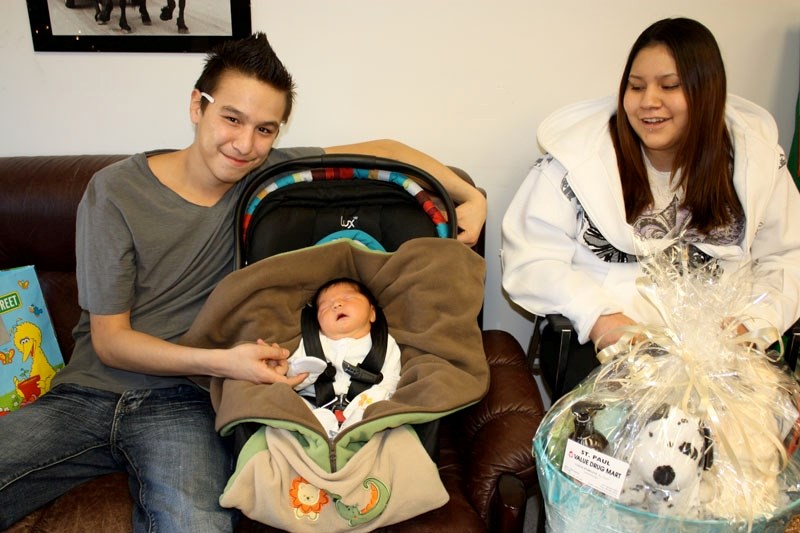 John Delver and Kaitlin Jackson hold their son, Dashielle Melvin Wallace Delver, the 2011 New Year&#8217;s baby. Dashielle was born Jan. 2 at 7:42 p.m. at St. Therese