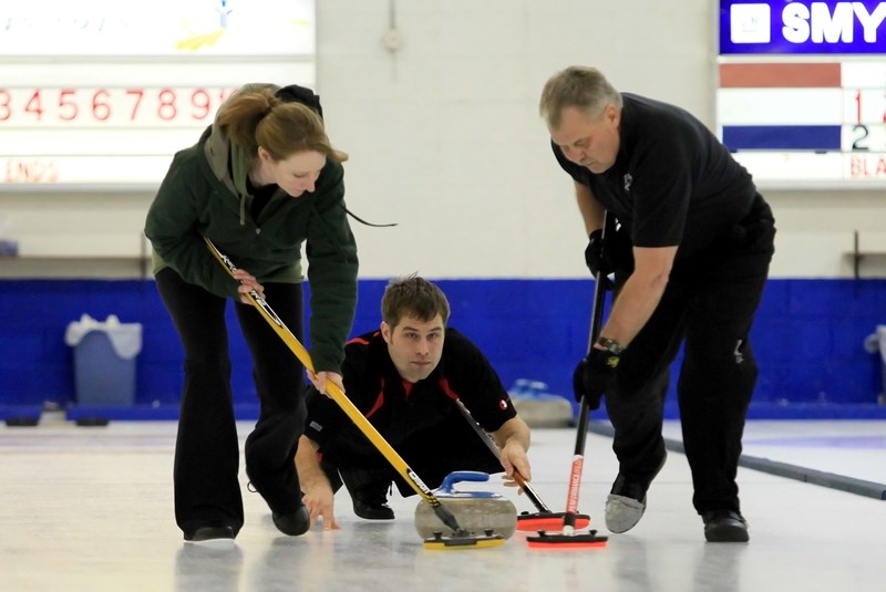 Jamie Robinson, Paul Kunnas, and Floyd Kunnas (L-R), are seen here during the Division B final game of the Zarowny Motors Superleague playoffs on Sunday afternoon at the St.