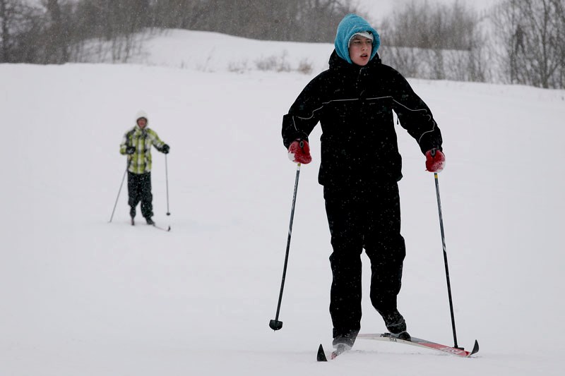 Shai Hawaniyk, a Grade 10 student from New Myrnam School, cross-country skis through temperatures of -24 degrees celsius and snow during the school&#8217;s Winter Active