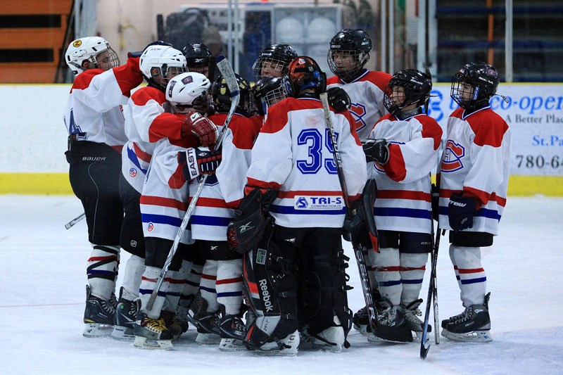 The Canadiens&#8217; Pee Wee A hockey team celebrate after the Group A final game between St. Paul and Marwayne at Clancy Richard arena on Sunday afternoon. The Canadiens