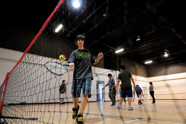 Noah Shankowski, 13, hits the ball back to his partner at the SPAN gym on last Tuesday. Shankowski has been playing tennis for nine years.