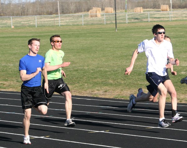 Several NEAT track and field athletes came home with medals from competitions in Calgary on the weekend. NEAT members Eric Laram ée (left), Alex Lawrence, and Marc Dubeau