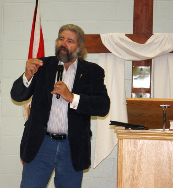 Minister of Infrastructure Ray Danyluk speaks to staff and students at Racette school on Friday.
