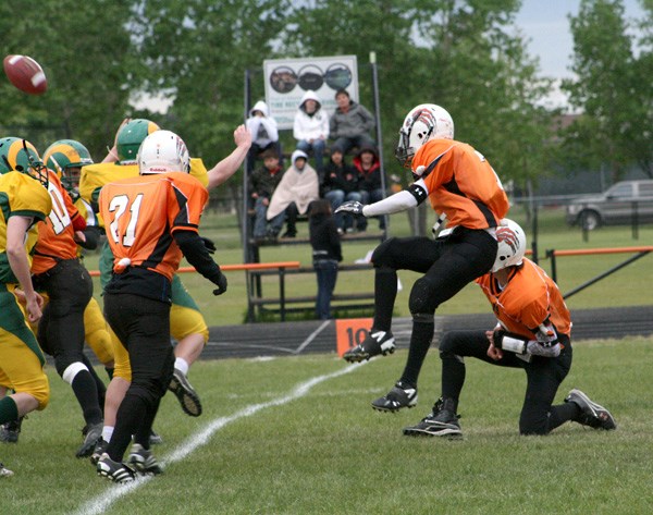 Jason Jubinville kicks the football for a conversion attempt on Thursday. Jubinville scored the only conversion point of the game at the end of the third quarter.