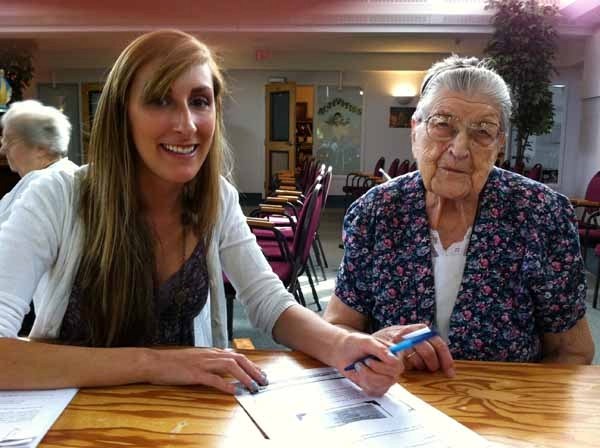 Natasia Ouellette records the story from Margaret Niedzielski, which will be on display at the Heritage festival on July 28.