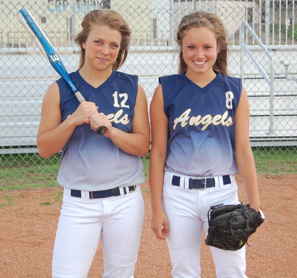 St. Paul athletes Shelbi Roy (left) and Jenelle Collins will have the chance to compete at the international level as they head to the 2011 Canadian Open Fastpitch