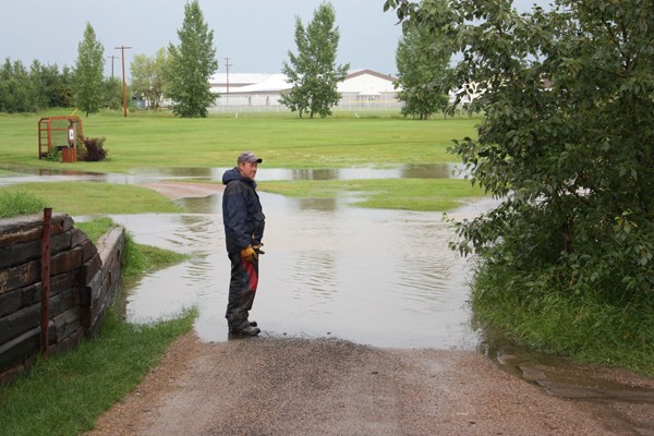 Rivers flowed through the St. Paul Golf Course after a storm Friday morning. Course superintendent Curtis Collins had to temporarily close parts of the course.