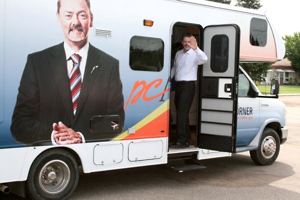 Progressive Conservative leadership candidate Doug Horner boards the campaign bus after a coffee and Q &#038; A at the Glendon Seniors Centre on Wednesday.