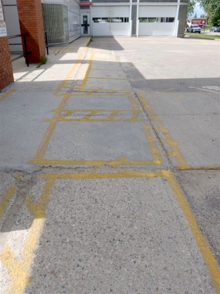 A photo of the sidewalk leading into the St. Therese Health Centre.