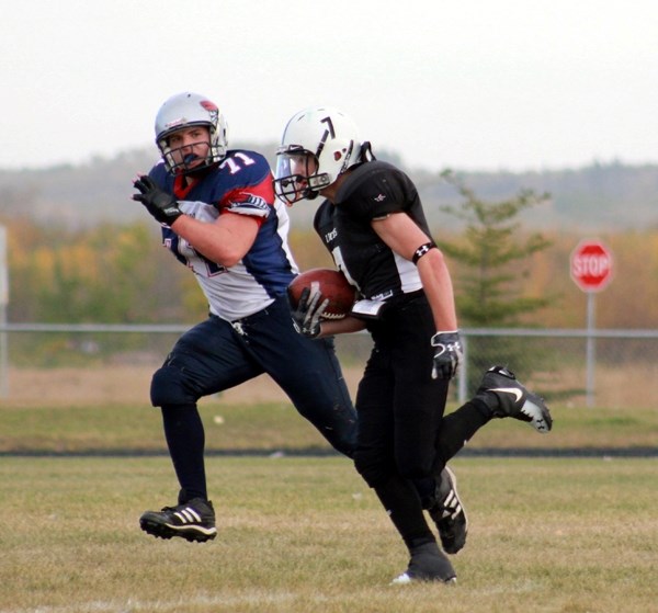 Jason Jubinville carries the ball in Friday&#8217;s game. Jubinville completed 93 yards on 14 carries in the game against the Bonnyville Voyageurs, helping the Lions to a