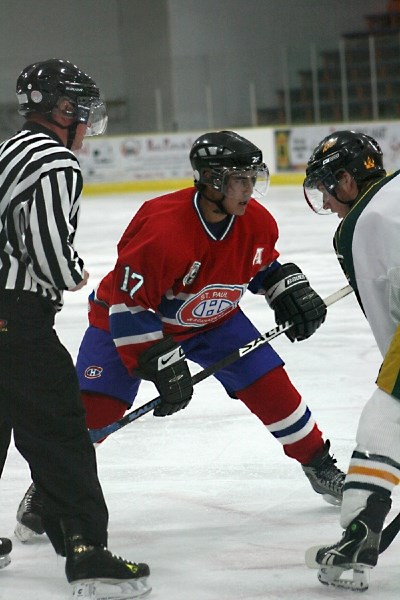 Canadiens assistant captain Skyler Giroux faces off against the Killam Wheat Kings on Sunday in St. Paul.