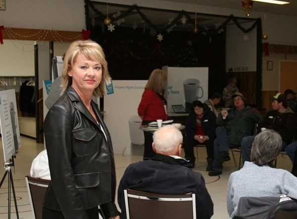 Property rights task force chair Diana McQueen, minister of Environment and Water, listens to one of the four groups providing feedback at the St. Paul Seniors Centre on