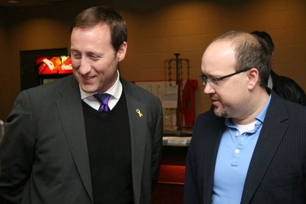 Minister of National Defence Peter MacKay (left) and local MP Brian Storseth greet attendees at a fundraiser lunch in Redwater on Friday.