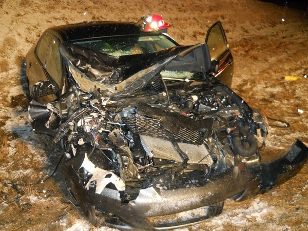 A Toyota Corolla after a collision with a semi tractor trailer near St. Paul on Highway 36 near Township Road 582 on Monday.