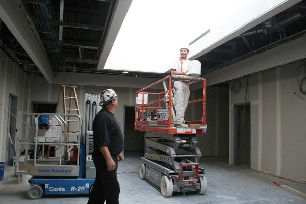 Pat Gartner (left) represents one of the project managers on the construction of St. Paul&#8217;s wellness centre. Here, he and one of the workers share a laugh while