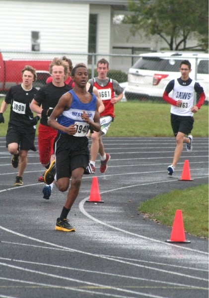 Runners battle through the cold and wet conditions during the zones track &#038; field meet at Regional last week. The Provincial meet takes place this weekend in Edmonton.