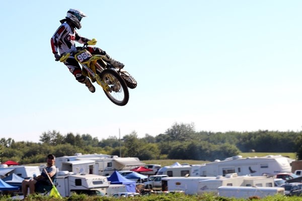 A rider takes to the skies at the 2012 Fountain Tire Miniseries at B3 Riverside MX Park on Sunday
