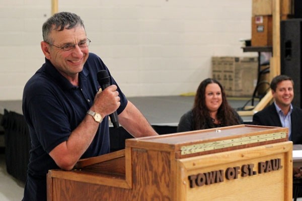 Queen Elizabeth II Diamond Jubilee Medal recipient Conrad Jean shares a smile with athletes and volunteers at the Conrad Jean Special Olympics Slo Pitch Tournament banquet on 