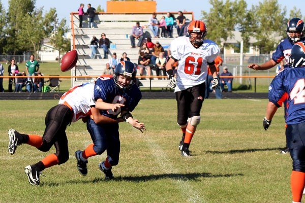 Isaac Porozni of the St. Paul Bengals sacks Lloydminster Chargers quarterback Brandon Thorimbert during the Bengals&#8217; 48-14 victory in their season opener on Saturday.