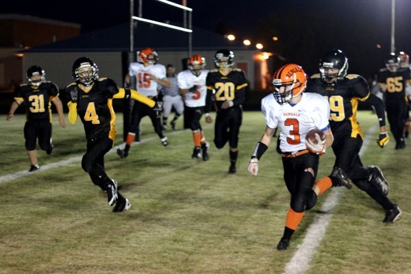 Bengals running back Liam Krys carries the ball into the end zone during the Bengals 33-20 victory over the Cold Lake Royals on Saturday night.