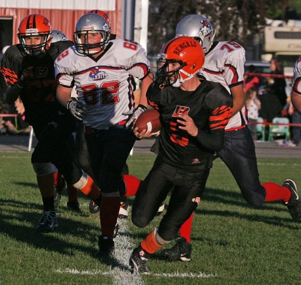 The Bengals move the ball upfield during their 66-19 loss against the Bonnyville Bandits on Friday night in Bonnyville.