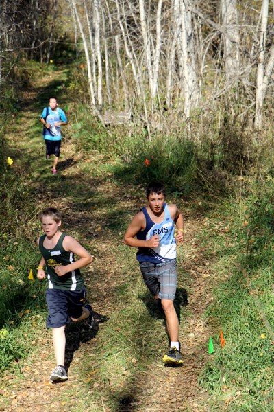Cross-country runners make their way through Westcove&#8217;s trails at the Sept. 26 SPAA cross-country event.
