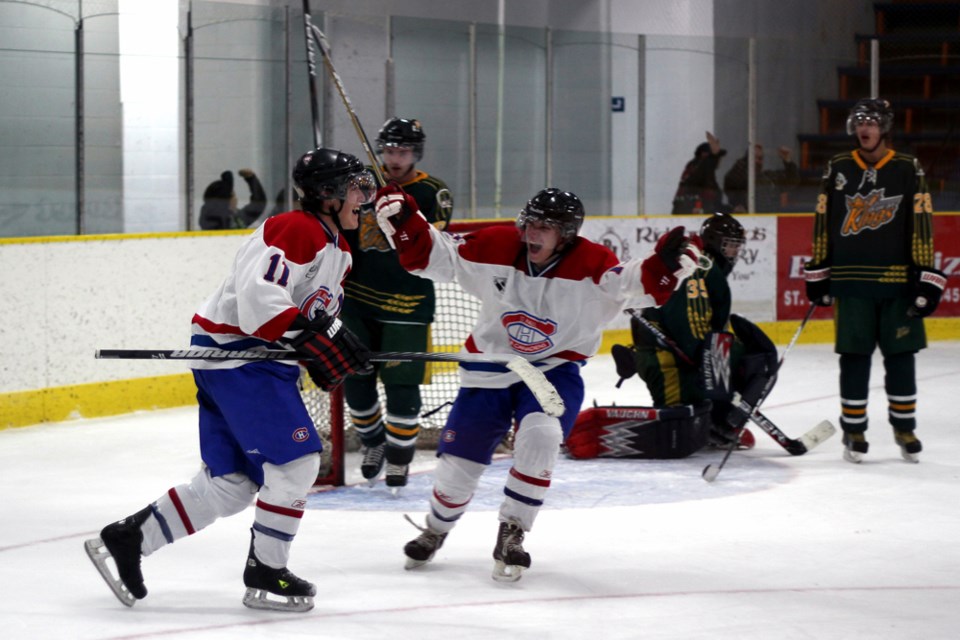 Canadiens Dylan Loughran and Tanner Hellquist celebrate Loughran&#8217;s overtime winner against the Killam Wheat Kings on Sunday evening. The Canadiens won the game 5-4 in