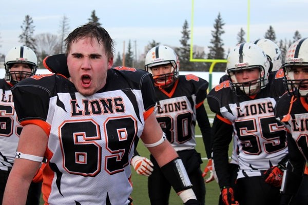 Dwight Garner motivates the Lions prior to the second half kickoff in St. Paul &#8216;s 52-10 Provincial Tier III Northern Finals loss last Saturday.