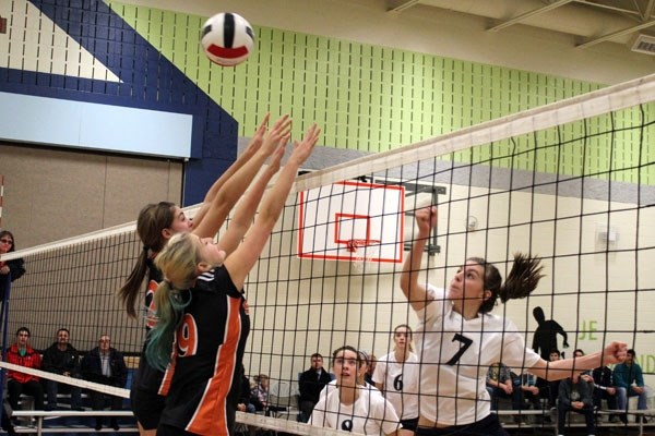 Mallaig&#8217;s Seleena Hebert punches the ball over the net during the Stingers&#8217; 15-9 tiebreaker victory over the Saints in the SPAA volleyball final last Wednesday