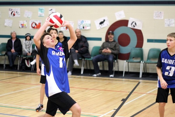 Racette&#8217;s Jeremie Pasitney sets up the ball in the SPAA Championship finals against Two Hills on Monday. Two Hill won the match in straight sets.