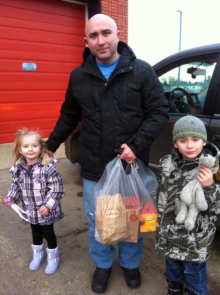 Lori Hynes&#8217; whole family has gotten behind a Christmas tradition that sees them perform 25 random acts of Christmas kindness (RACK). Here, her husband Robert and