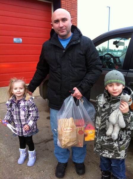 Lori Hynes&#8217; whole family has gotten behind a Christmas tradition that sees them perform 25 random acts of Christmas kindness (RACK). Here, her husband Robert and