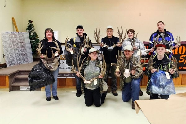 Winners gather with their sizable antlers at Saturday&#8217;s Ashmont Buck of the Season event, held at the Ashmont Agriplex.