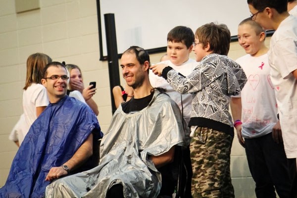 Head, beard and mustache shaving became a part of the Hats for Healing Pink Heart auction last Sunday, as Yvon and David Amyotte agreed to the shave if employees of A.