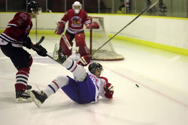 Tanner Hellquist of the St. Paul Canadiens loses his edge in a 6-3 loss to the Saddle Lake Warriors at Manitou Kehiw Arena on Saturday.